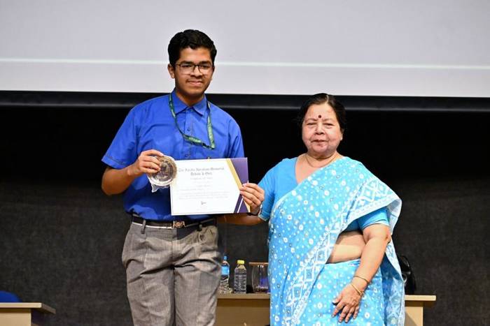Vedant Agrawal receiving the Certificate of Merit at the Farida Abraham Memorial Debate